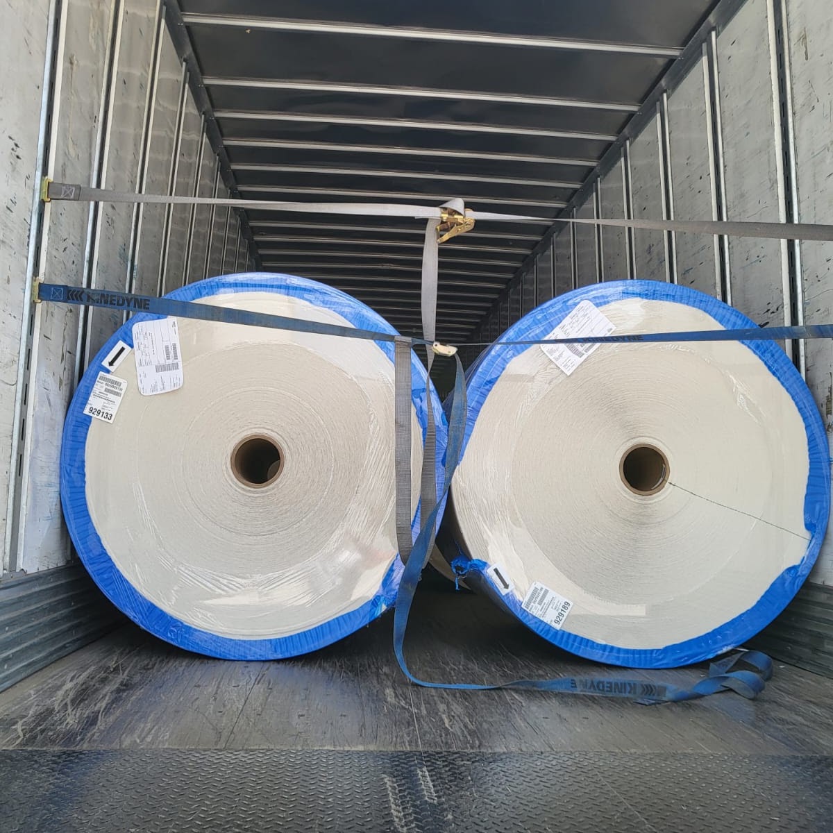 Large paper rolls strapped securely inside an ELG dry van trailer